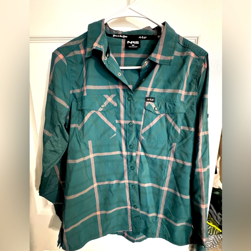 Women’s sweat wicking button up.